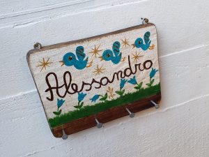 Appendino con uccellini e campanelle azzurre