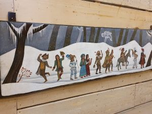Pannello con danza delle Maschere